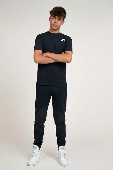 RUBBER BADGE SWEAT PANTS DEEP DARK BLUE by NIK & NIK